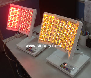 Máquina portátil do diodo emissor de luz Phototherapy com luz vermelha/azul/amarela para o tratamento da cara